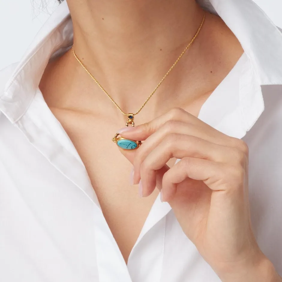 The Met Store Necklaces*Wedjat Eye Scarab Spinning Pendant Necklace